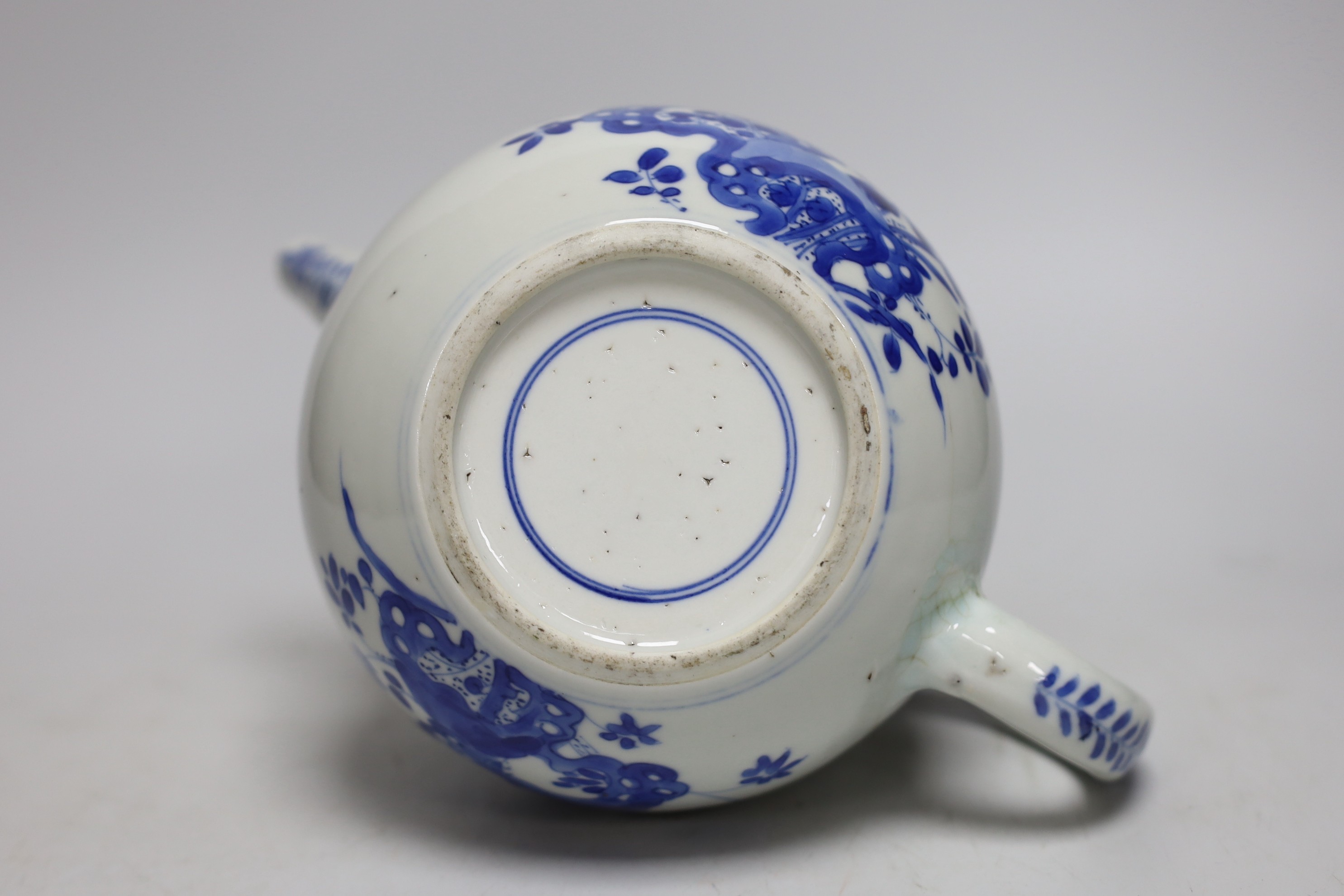 A Chinese blue and white tea or wine pot, Kangxi period, 17cms high